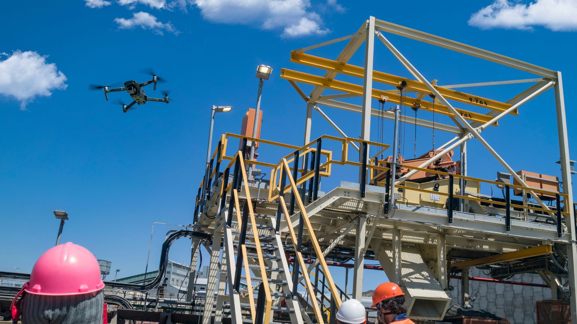 Drone Technology Being Used at a Construction Site with Engineers and Modern Equipment, Showcasing Digital Innovation at Giga Projects