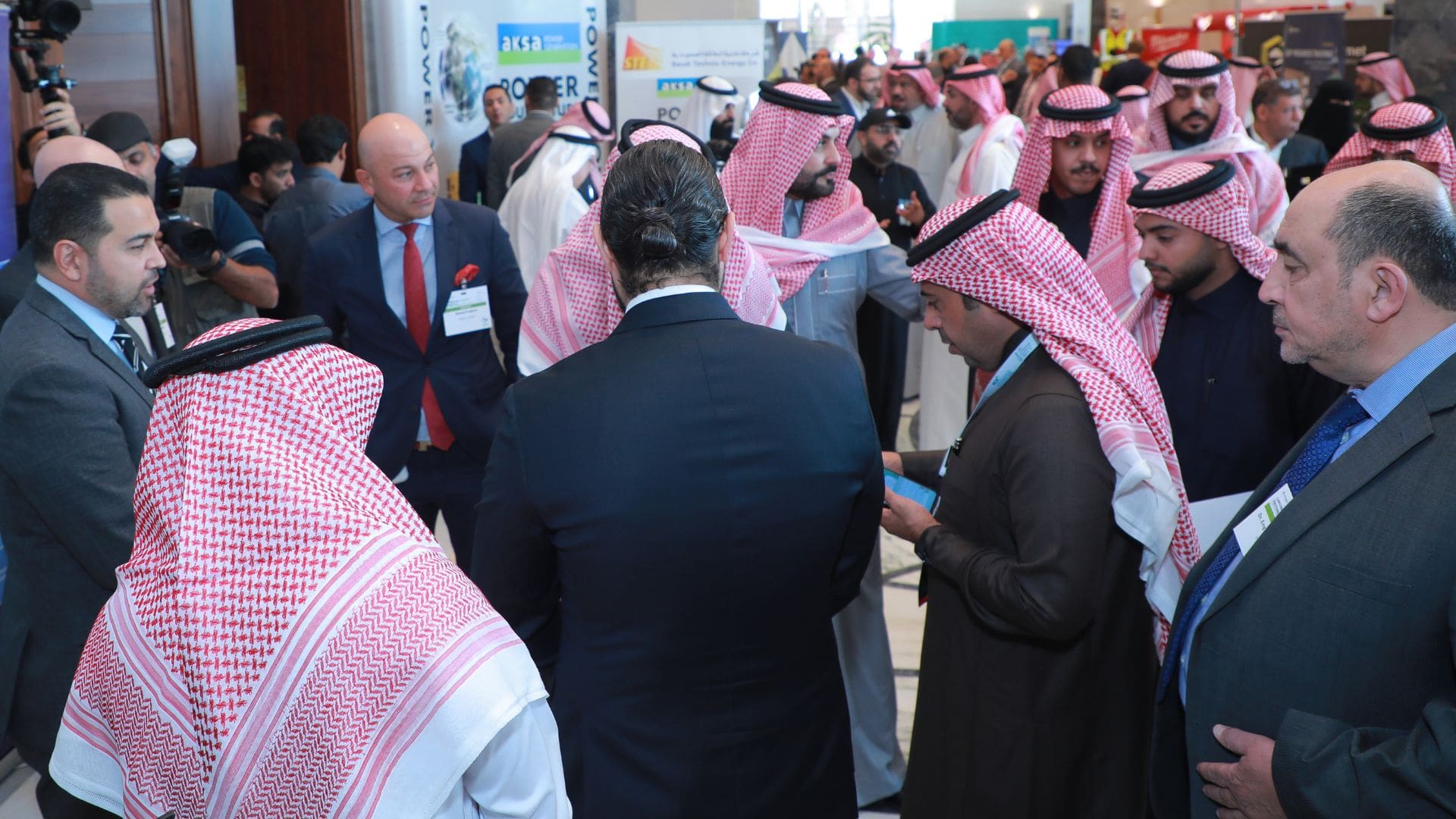 A group of professionals discussing Construction Technology ConFex KSA